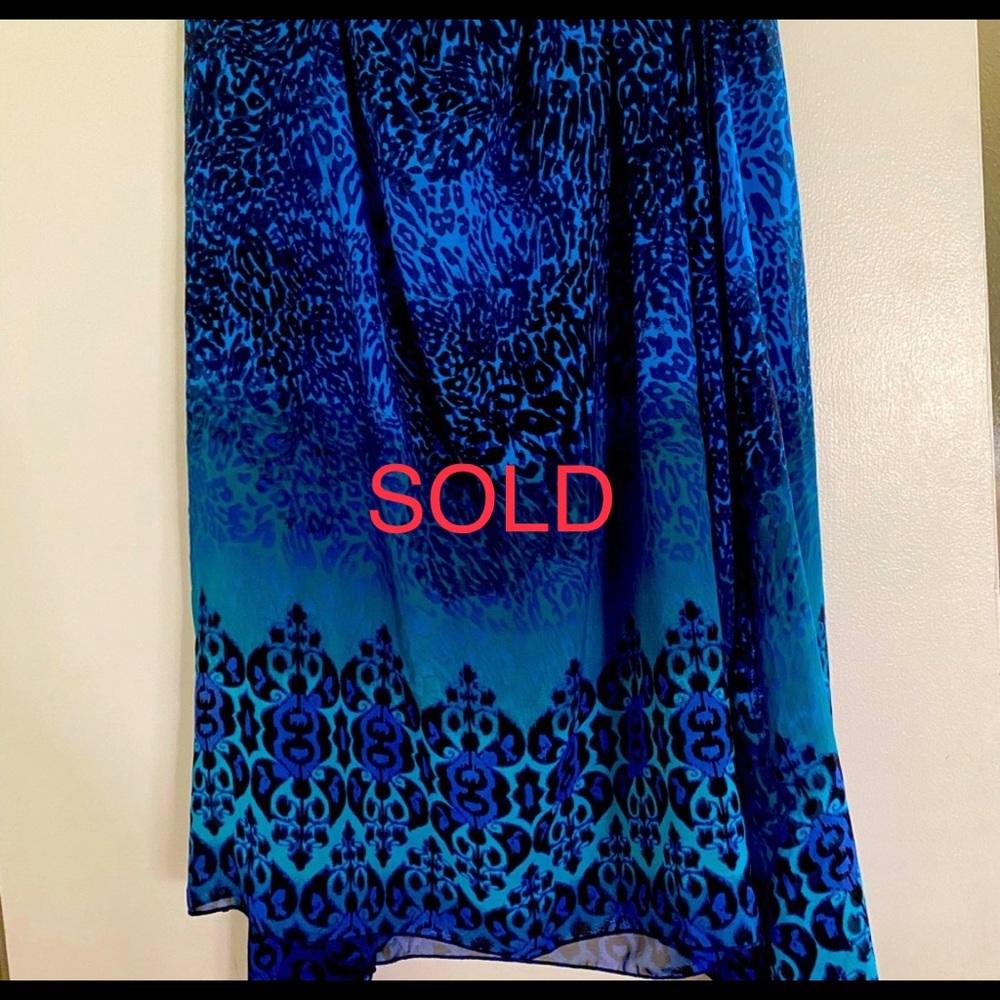 Cute silk skirt bright in color..